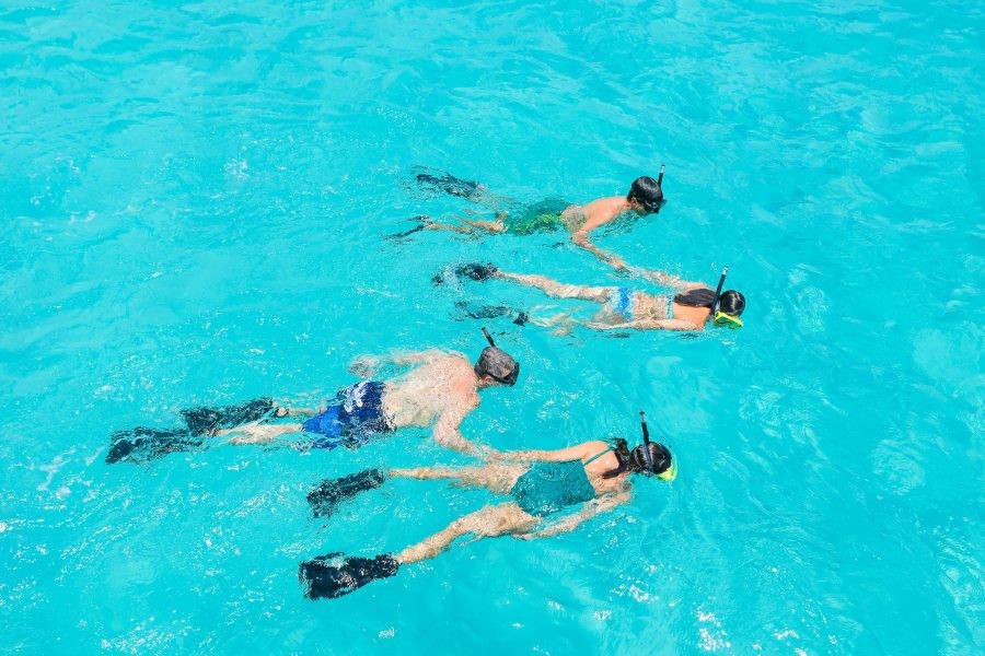 Family snorkeling in Nassau Paradise Island, The Bahamas