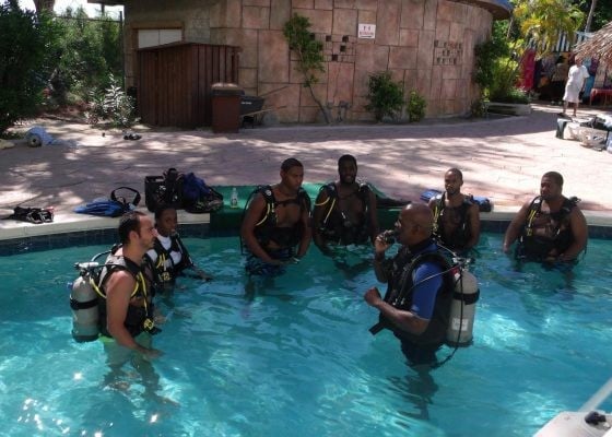 A scuba diving lesson takes place in Nassau Paradise Island, Bahamas