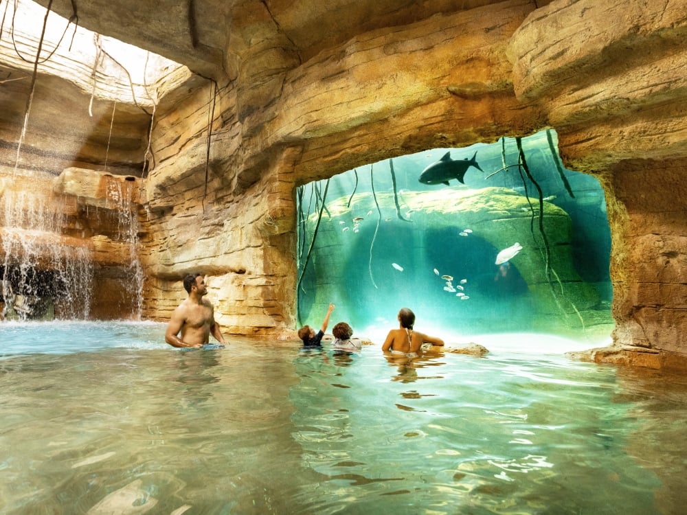 A family in the pool at Atlantis Paradise Island