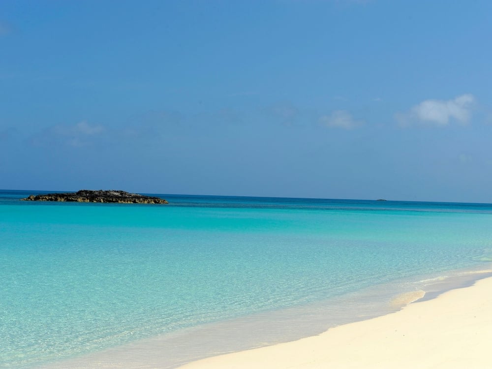 beach with bright blue water