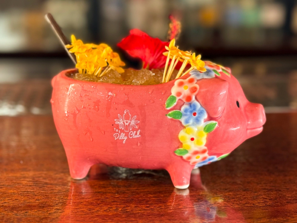 cocktail in a cup shaped like a pig