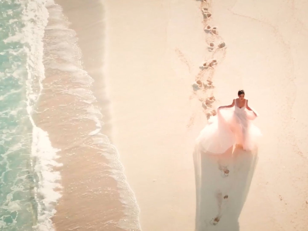 bride walking the beach 