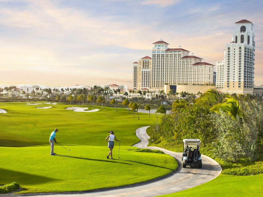 golf course with hotel in the background