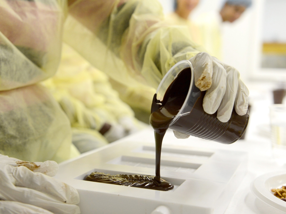 Chocolate pouring at Graycliff Chocolate Factory