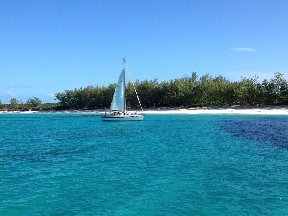 Sailboat in blue water