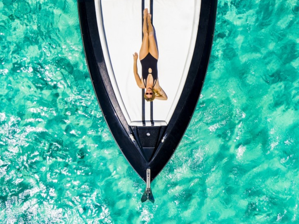 Woman laying on a boat